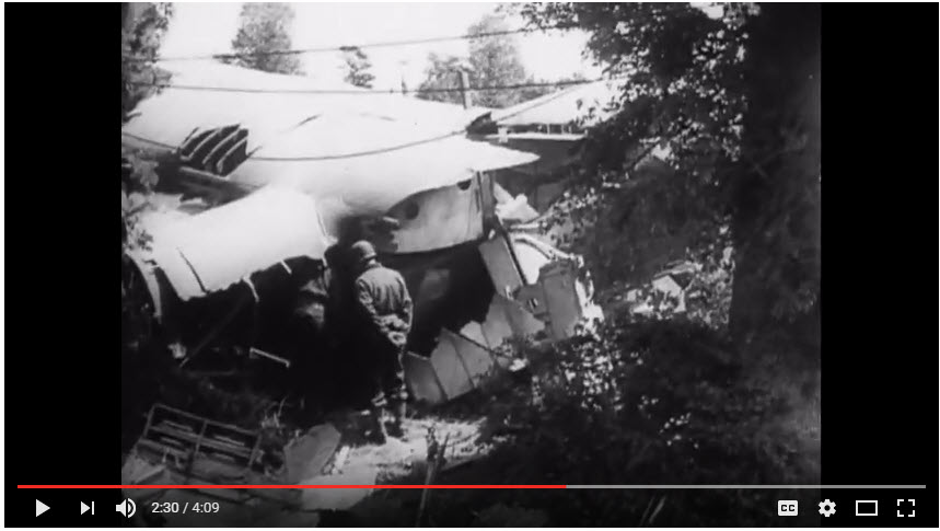 Horsa crash near road with sky.jpg